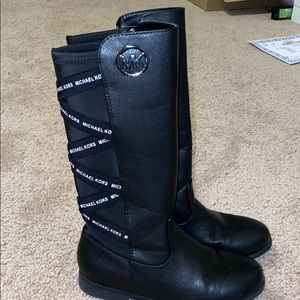 Girls Michael Kors black boots.